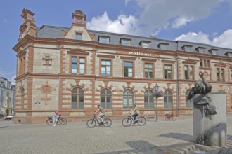Historic post office and post office fountain with sculpture symbolising the Silent Post, fountain,