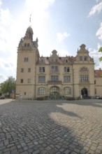 Town hall in neo-renaissance style with backlight, sunbeams, Bernburg, Saxony-Anhalt, Germany