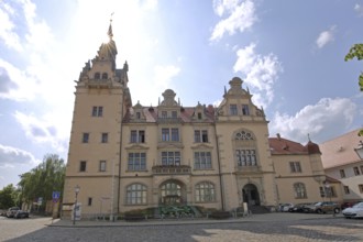 Town hall in neo-renaissance style with backlight, sunbeams, Bernburg, Saxony-Anhalt, Germany