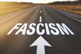 Street with white word 'Fascism' and arrow written on it with storm in sky. Concpet for countries