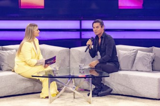 Julio Iglesias Jr. in conversation with Beatrice Egli at the Beatrice Egli Show in Studio Berlin