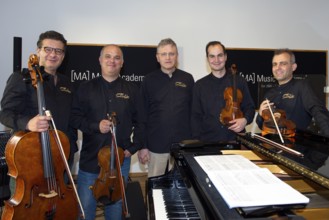 Massimo Guidetti (pianist), Pierluigi Ruggiero (cellist and artistic director), Sebestyen