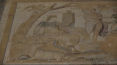 Ancient mosaic with a female figure and others in a scene under a tree, The Choice of Paris,