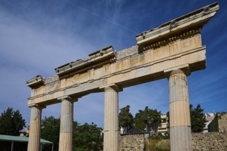 Close-up of ancient column ruins against a clear blue sky, Archaeological Site, Xysto Columned