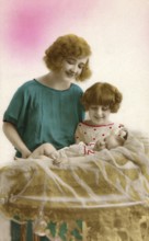 1920, Mother, child, baby, mother looking smiling at a baby in a pastel-coloured room, historical
