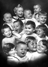 Laughing babies, 1930s, A group of smiling babies and toddlers in a studio portrait, Historical