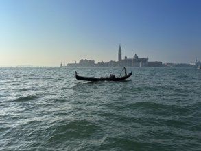 Gondola on the lagoon off Venice, lagoon city of Venice, Veneto, Italy