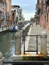 Boats on a canal in Venice, lagoon city of Venice, Veneto, Italy