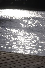 Jetty on a glittering lake, Germany