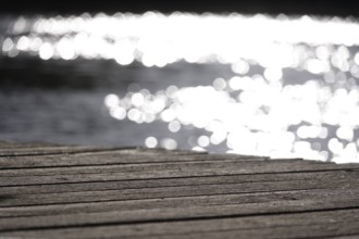 Jetty on a glittering lake, Germany