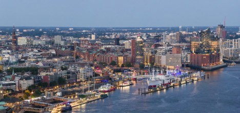 Panoramic aerial view of the Landungsbrücken in the harbour at blue hour with the Elbphilharmonie