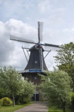 Windmill De Stormvogel (in German: The Storm Bird) octagonal tower mill, Loppersum, Eemsdelta,
