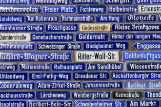 Collection of blue street signs with different street names, Amorbach, Odenwald, Bavaria, Germany
