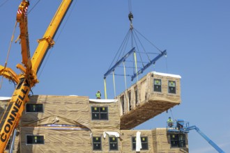 Detroit, Michigan - Workers use modular construction methods to build apartments for low to