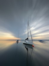 Evening atmosphere, sailing boats on Lake Starnberg, zoom effect, Bavaria, Germany