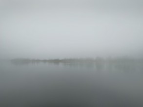 Fog over Lake Starnberg, Bavaria, Germany