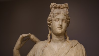 Close-up of the head of a sculpture depicting Artemis with typical hairstyle, Archaeological