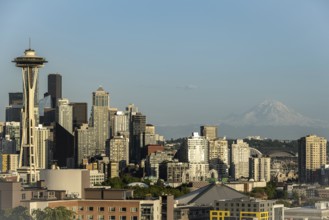 Seattle skyline at golden hour with Mt Rainier in the background, Washington, USA, North America