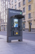 Defibrillator on a city street ready for emergency use in urban areas, London, United Kingdom,