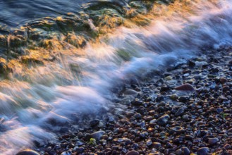 Wave play at sunrise on the chalk coast in Jasmund National Park, Rügen, Sassnitz,