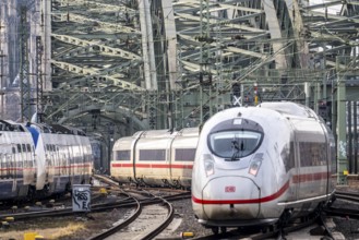 Rail track in front of Cologne Central Station, Hohenzollern Bridge across the Rhine, ICE