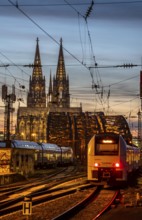 Rail track in front of Cologne Central Station, Hohenzollern Bridge across the Rhine, regional