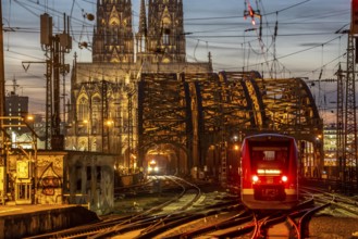 Rail track in front of Cologne Central Station, Hohenzollern Bridge across the Rhine, regional