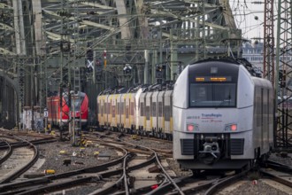 Rail track in front of Cologne Central Station, Hohenzollern Bridge across the Rhine, Transregio