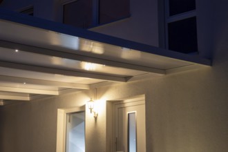 Modern entrance canopy with integrated LED lighting for an inviting house entrance