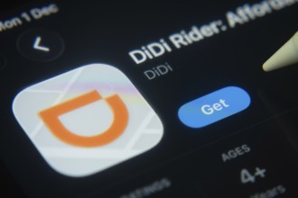 Dhaka, Bangladesh- 01 Dec 2025: A close-up of the DiDi Rider app icon in the App Store on an iPad