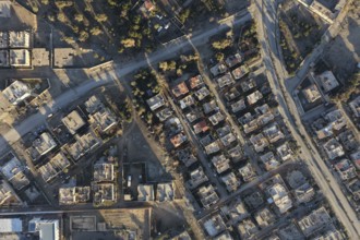 In Deir ez-Zor, Eastern Syria on January 21, 2026, an aerial drone shot captures the city landscape