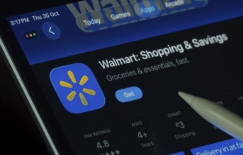Dhaka, Bangladesh- 30 Oct 2025: Walmart app displayed on a iPad screen in dark mode with a digital