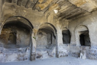 Historic cave with architectural structures and decorative elements, Tamaris Darbasi, Tamaras Hall,