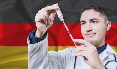 Doctor holding syringe on Germany flag background. Medical professional holding syringe with German
