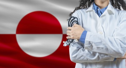 Healthcare professional with Greenland flag background. Professional doctor holding stethoscope on