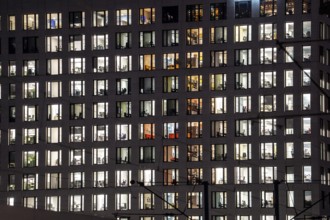 Office building, many windows are illuminated, Cologne, North Rhine-Westphalia, Germany