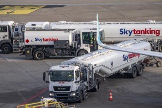 Refueling an aircraft after landing, in front of takeoff, air fuel, kerosene, Skytanking tank truck