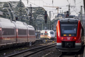 Rail track in front of Cologne Central Station, Hohenzollern Bridge across the Rhine, ICE