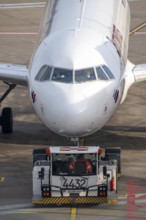 Eurowings Airbus is pushed from the gate onto the taxiway, ready to go, to Cologne/Bonn Airport,