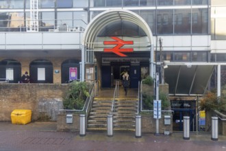 Staircase leading to entrance and sign Welcome to Reading Station railway station, Reading,
