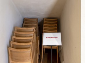Stacks of wooden chairs in the restored and reopened garrison church in Breiten Straße, Potsdam,
