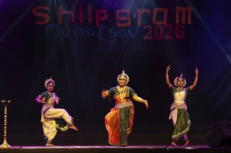 Artists perform Odissi classical dance during a cultural evening program at Shilpgram Mohotsav 2026