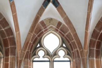 Gothic window, fountain chapel, connected to blue by monastery canal, Blaubeuren Abbey, Swabian
