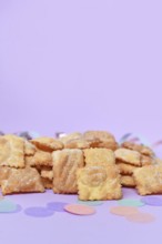 Rhenish pastries called 'Mutzen pastries or Muzenblätter' with powdered sugar on festive background