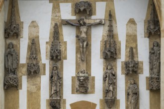 Christ sculpture and remains of the former monastery church of S. Johannes Baptistam above portal