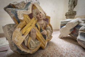 Medievally dressed woman with cross, remains of a wall relief, Blaubeuren Abbey, Swabian Jura,