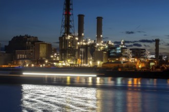 Evening shot of BASF in Ludwigshafen with the Rhine in the foreground