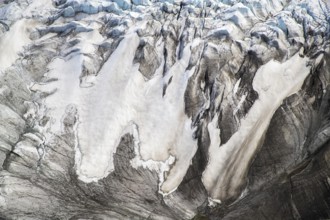 Aerial view of Greenland ice sheet, Arctic landscape, frozen wilderness, glaciers and snow-covered