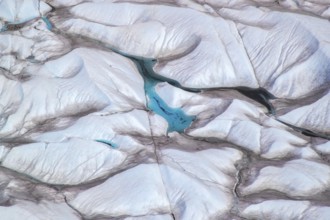 Aerial view of meltwater on the Greenland ice sheet, Arctic landscape, frozen wilderness, glaciers