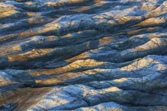 Aerial view of Ice sheet in Greenland, Arctic landscape, frozen wilderness, glaciers and